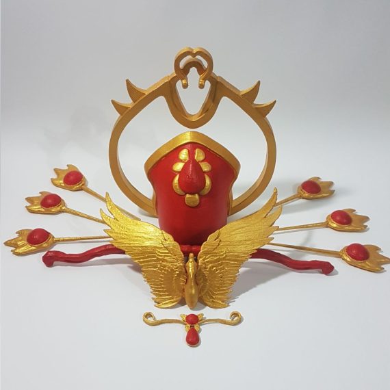 Conjunto de accesorios dorados y rojos diseñados para la corona diurna de Reina del Carnaval